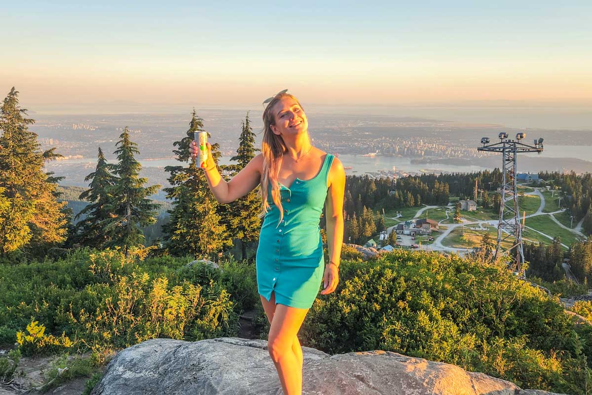 Bailey with a beer at the top of the Peak Chairlift on Grouse Mountain, Vancouver