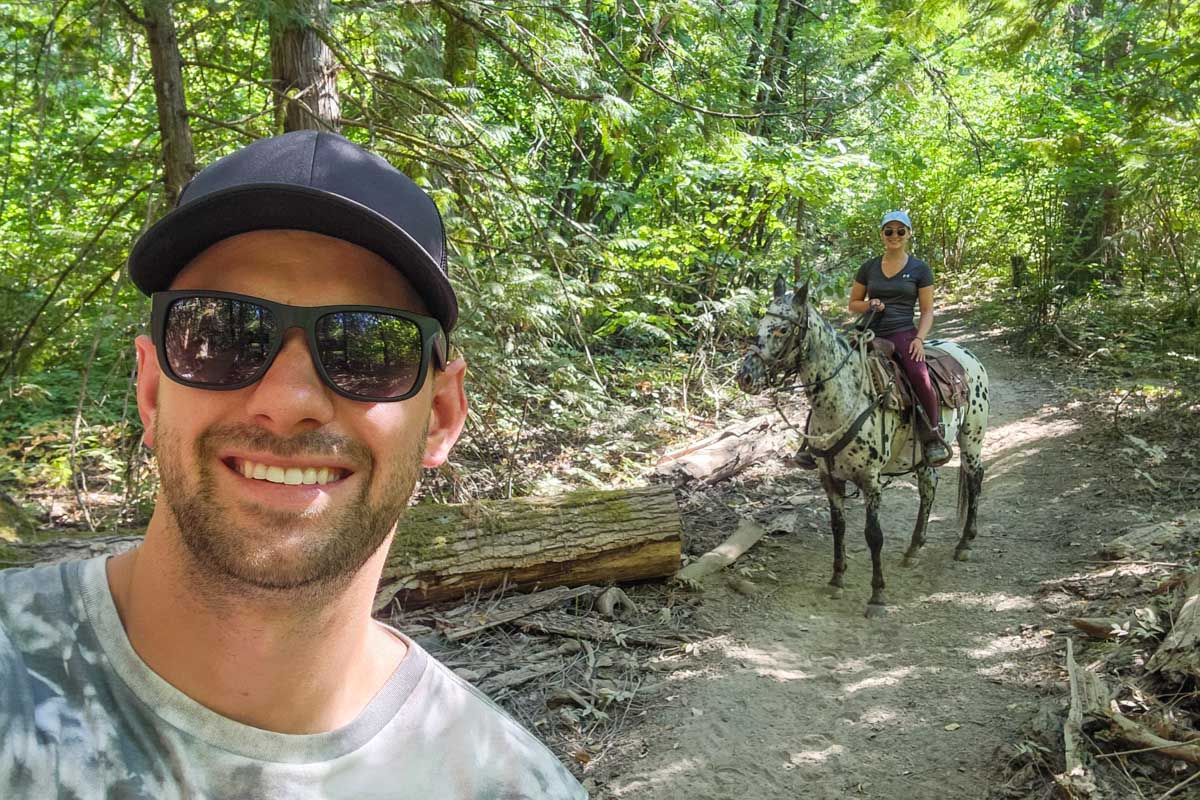 Daniel and Bailey horseback riding at Boundary Ranch 