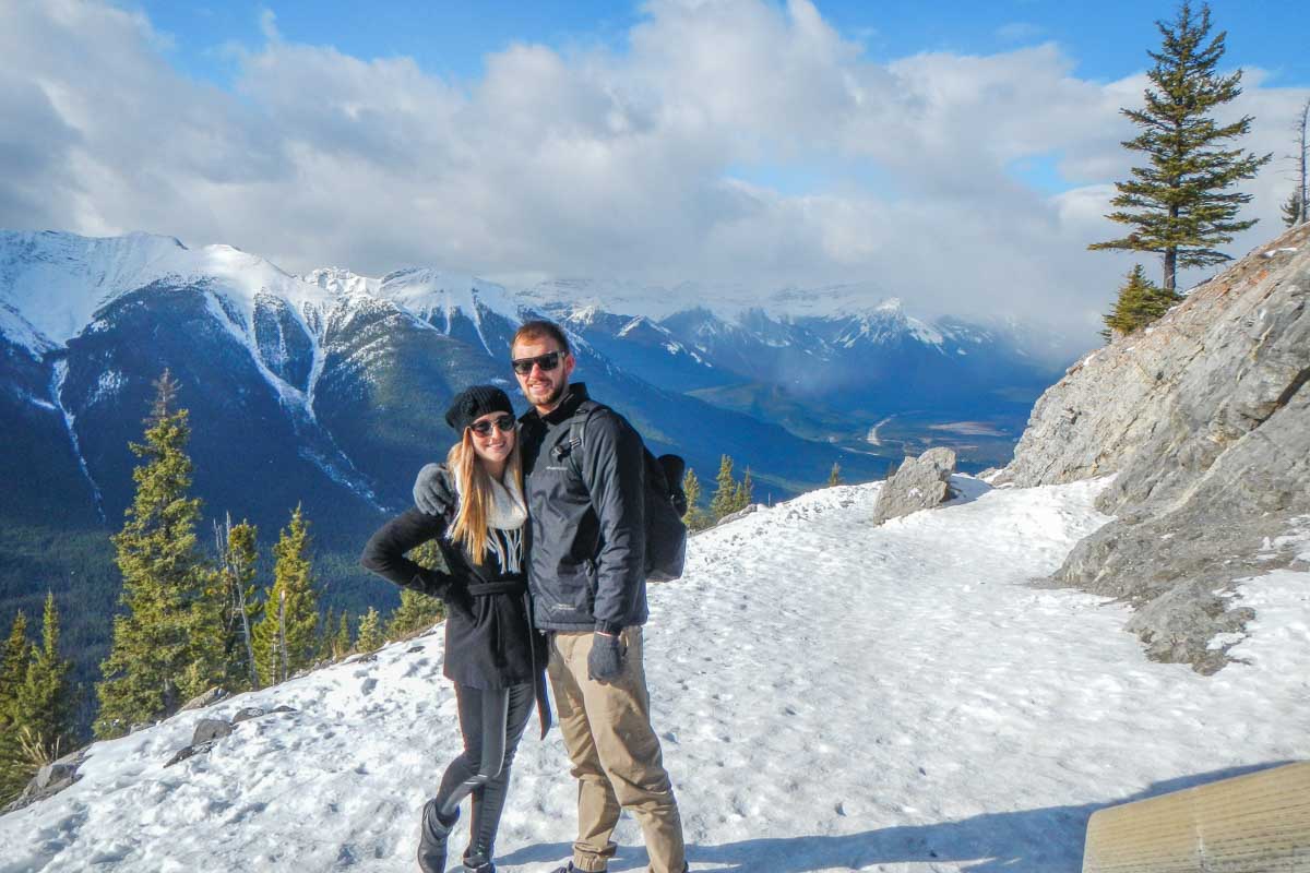 Daniel and Bailey in the snow at the top of the Banff Gondola