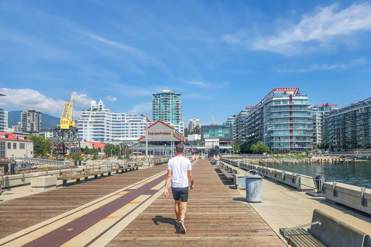 Daniel walks the Burrard Dry Dock Pier in Lonsdale Quay, Vancouver