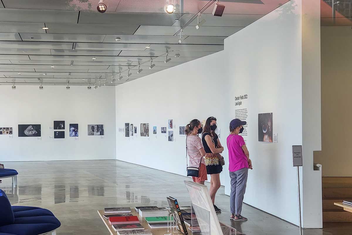 People look at art at the The Polygon Gallery in Lonsdale Quay