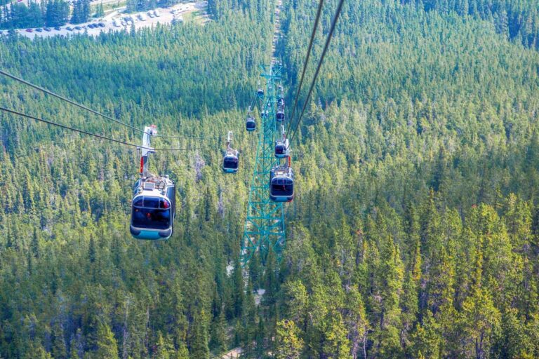 The view of the cables and cars of the Banff Gondola as they make their way up to Sulphur Mountain