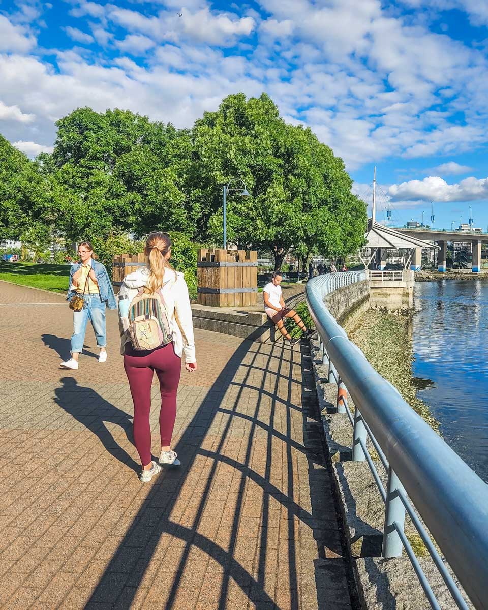 Bailey walks the Vancouver seawall in Yaletown