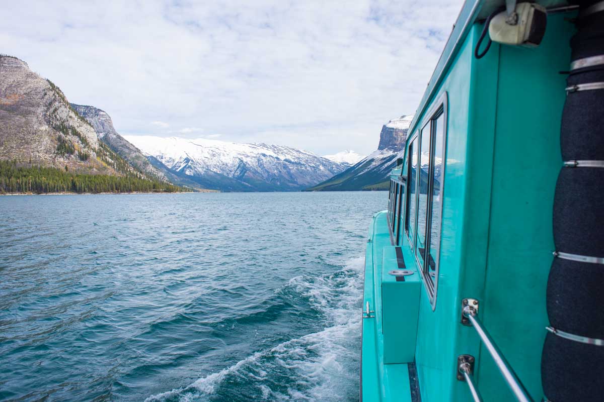 Sailing along the lake on a Lake Minnewanka Cruise in Banff National Park
