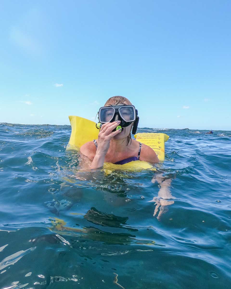 A lady snorkeling on a Mamanuca Island Tour in Fiji