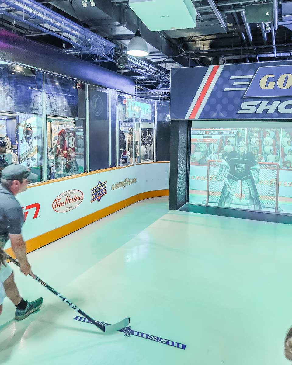 A man plays a hockey game at the Hockey Hall of Fame in Toronto