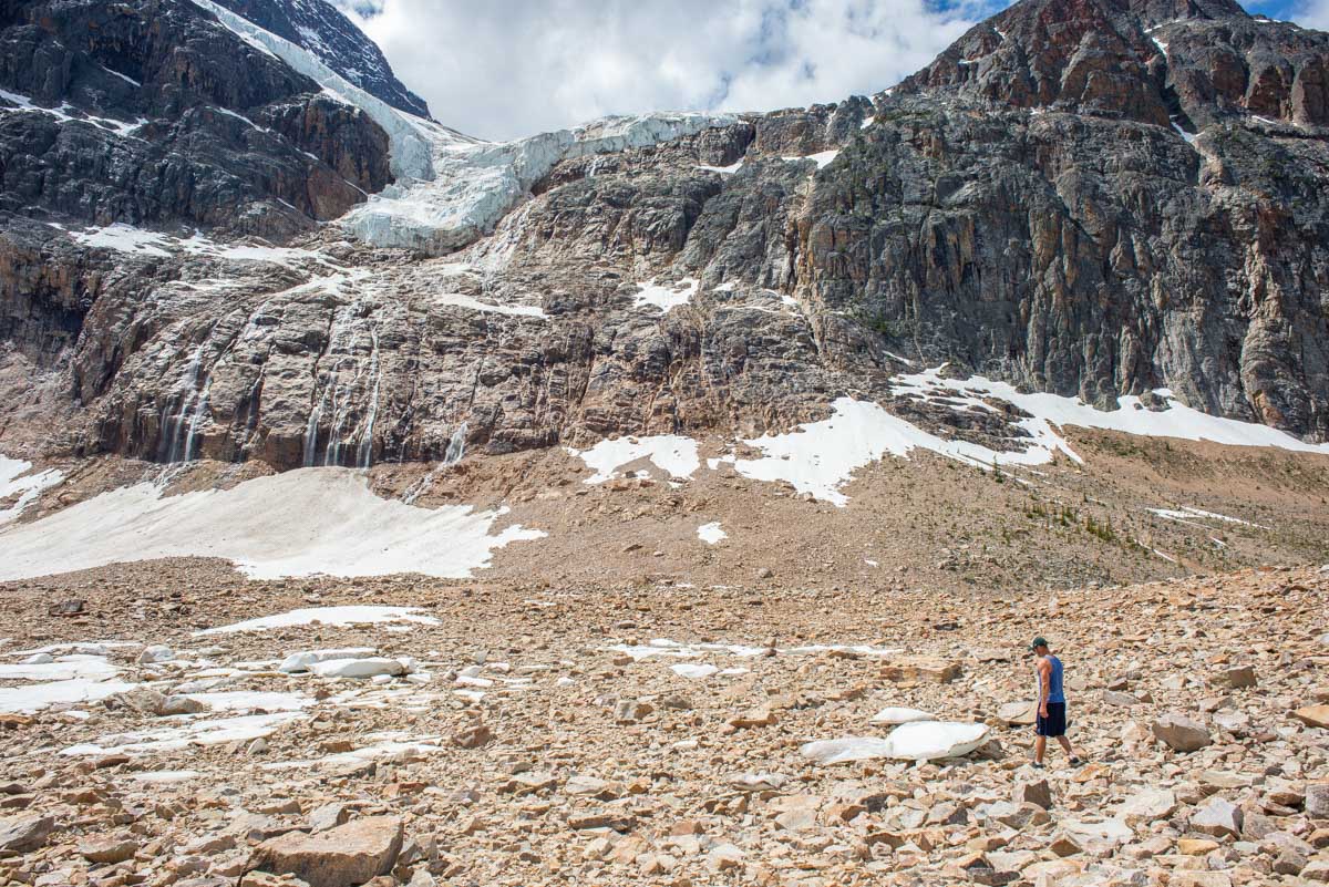A man walks through the valley below Mount Edith Cavell, Jasper