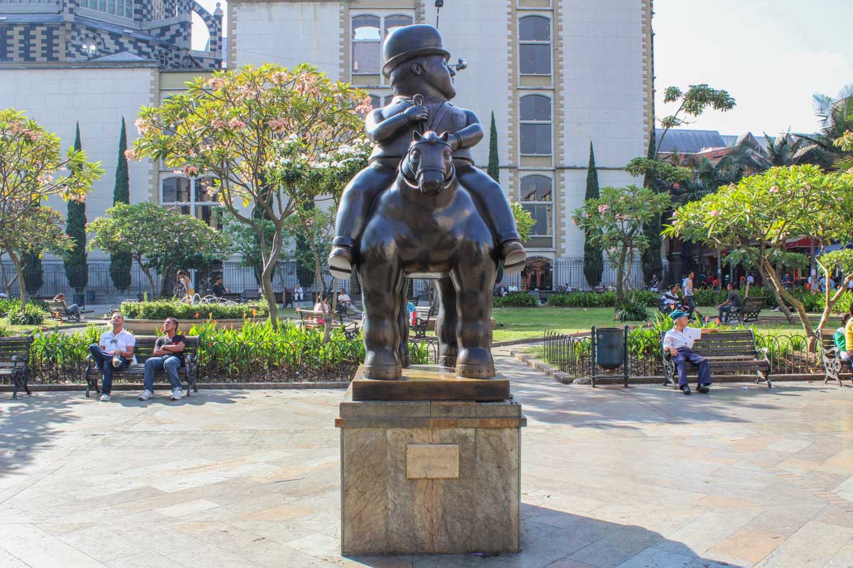 A statue in Plaza Botero, Medellin on a bike tour