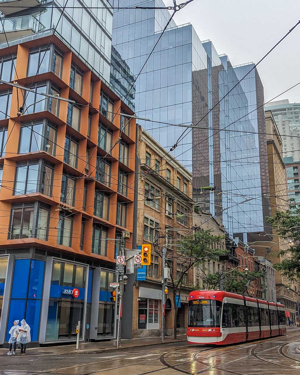 A tram travels through the city of Toronto, Canada