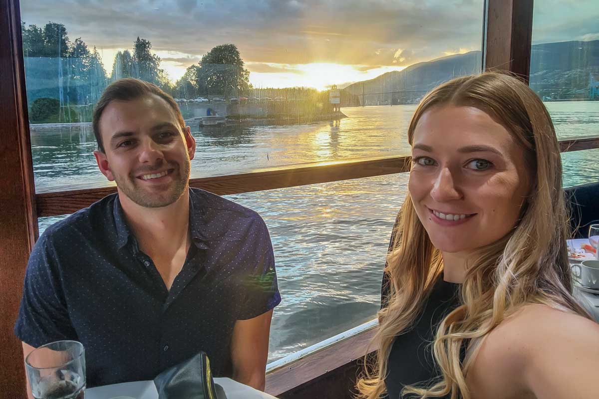 Bailey and Daniel take a selfie on a sunset cruise in Vancouver