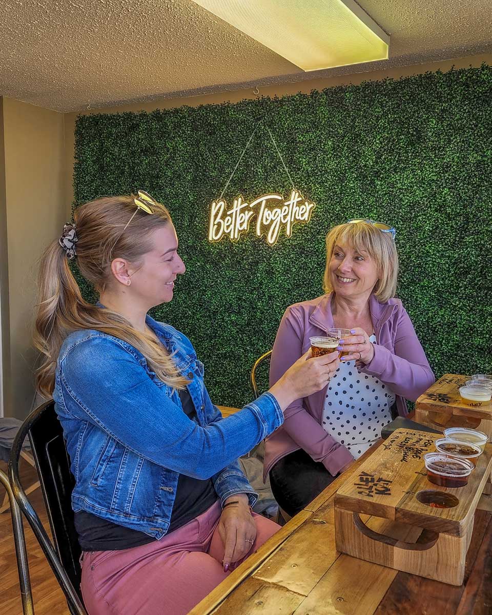 Bailey and her mum at Alley Kat Brewing in Edmonton
