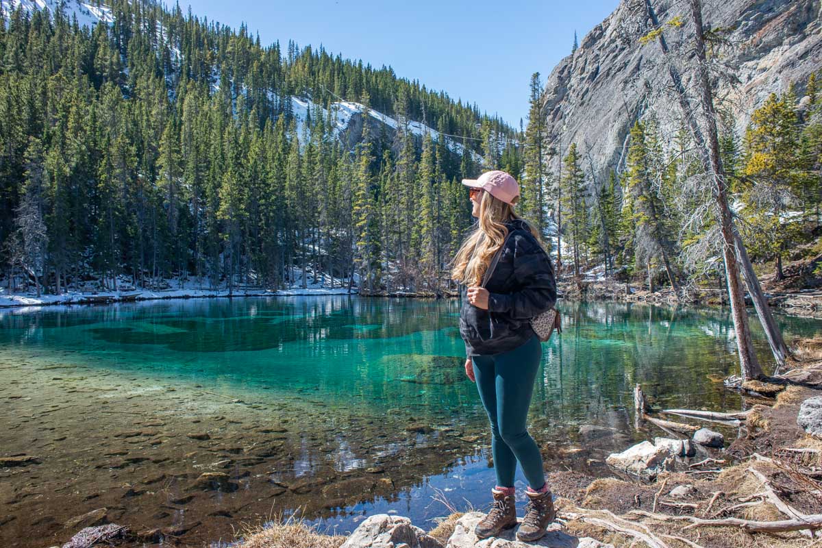 Bailey stands on the edge of Grassi Lakes, Canmore
