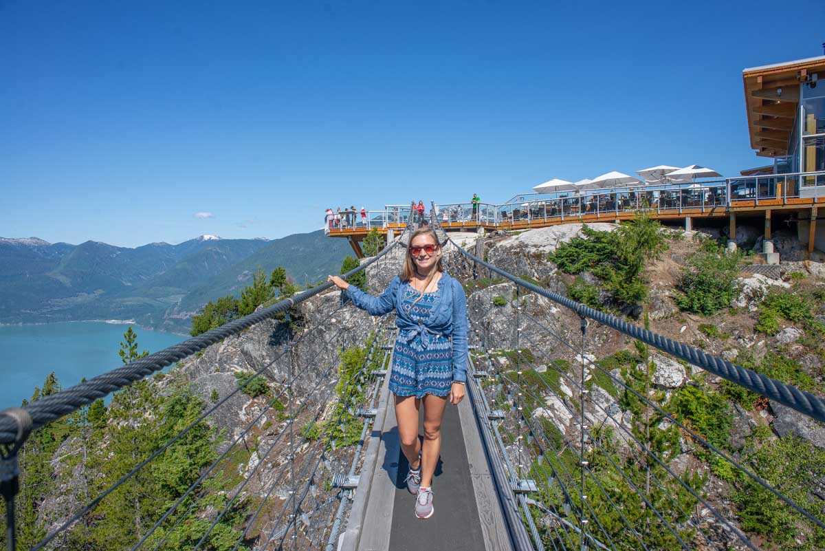 Bailey walks across the The Sky Pilot Suspension Bridge at the top of the Sea to Sky Gondola