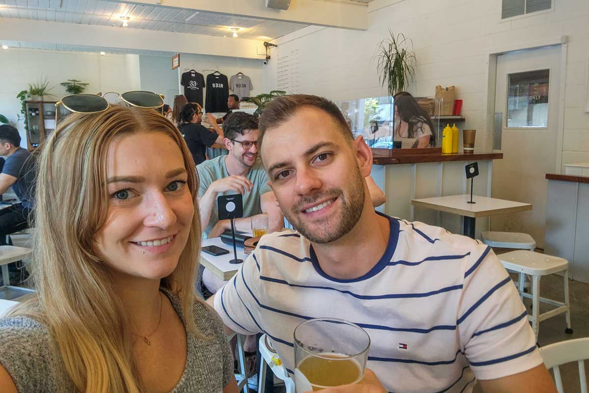 Daniel and Bailey at 33 Acres Brewing tasting beer in Vancouver
