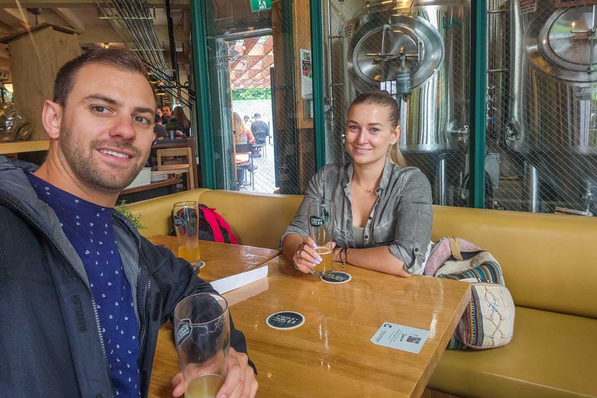 Daniel and Bailey enjoy craft beer at Stanley Park Brewing in Vancouver