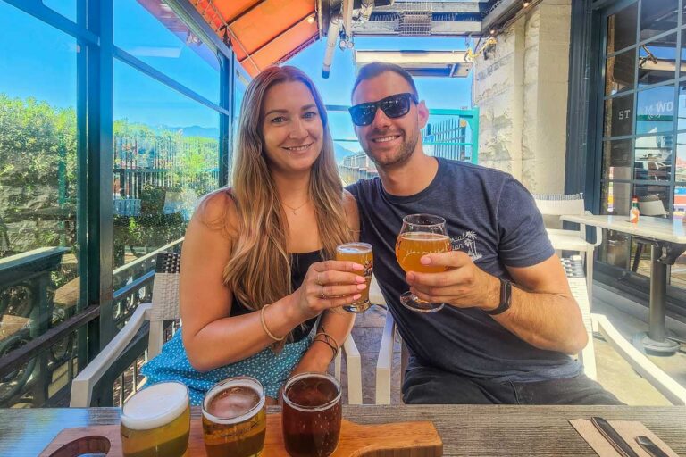 Daniel and Bailey try beer from Steamworks Brew Pub on a Vancouver brewery Tour