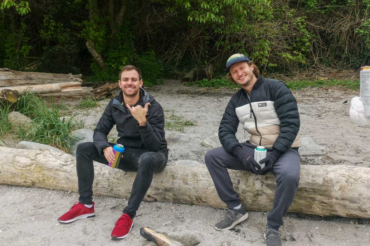 Daniel and his firend have a drink at Kitsilano Beach