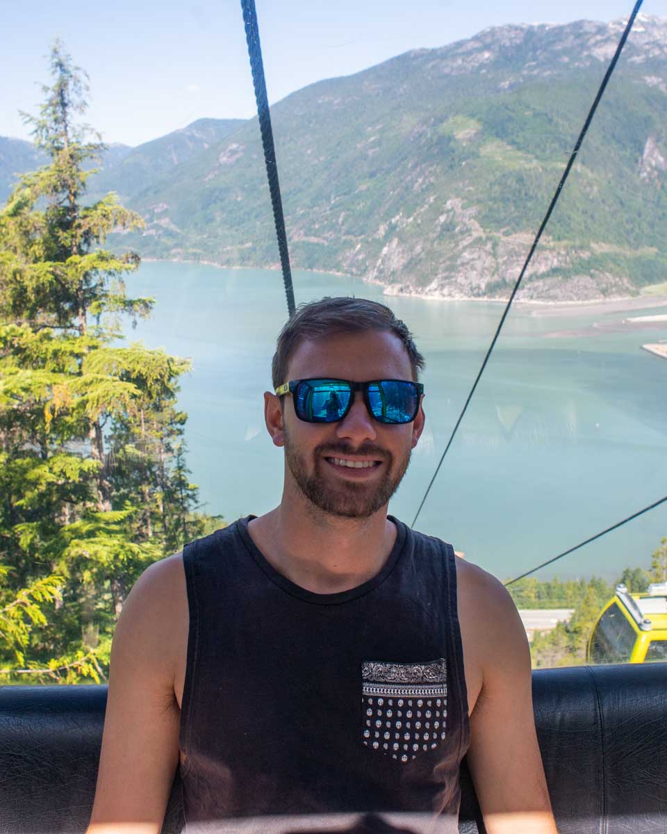 Daniel sits inside the Sea to Sky Gondola near Vancouver, Canada