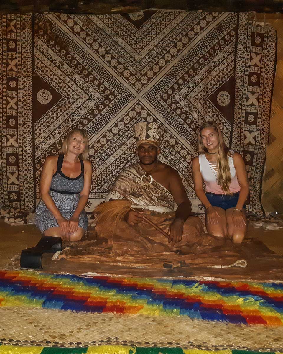 Sitting with the chief of a village on a Fiji Night Show tour