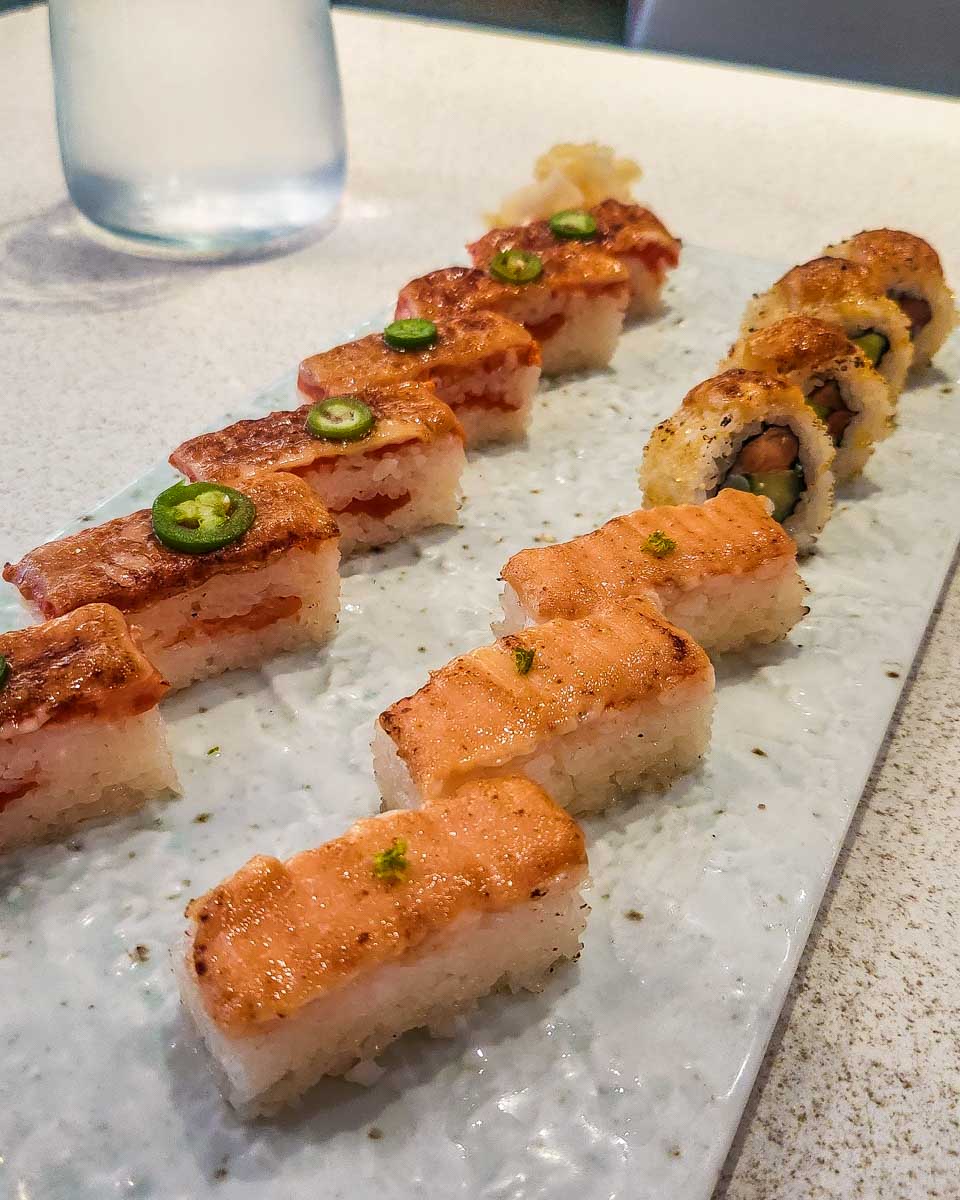 some colorful sushi one a plate at Miku in Toronto