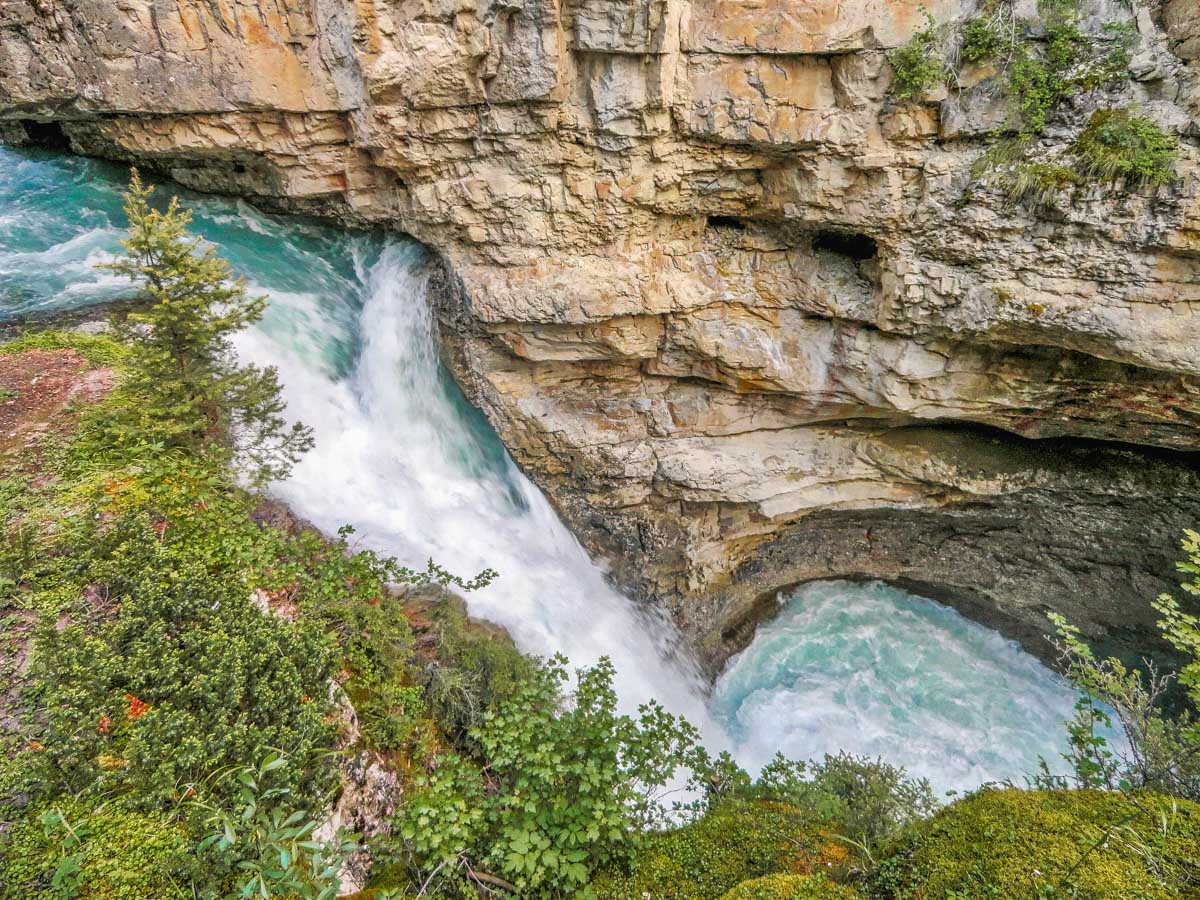 Water rushes through Johnston Canyon in Banff National Park
