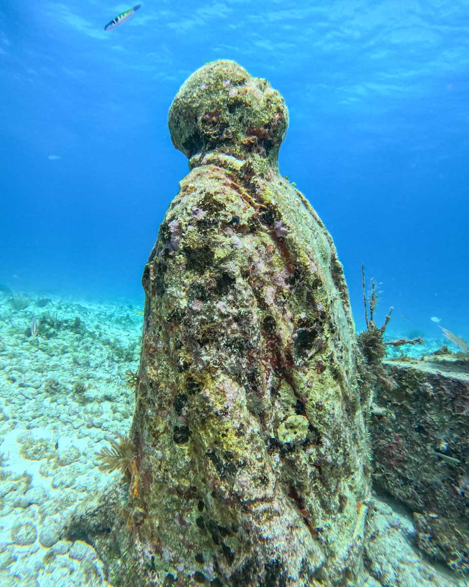 A statue at the MUSA Reef in Cancun