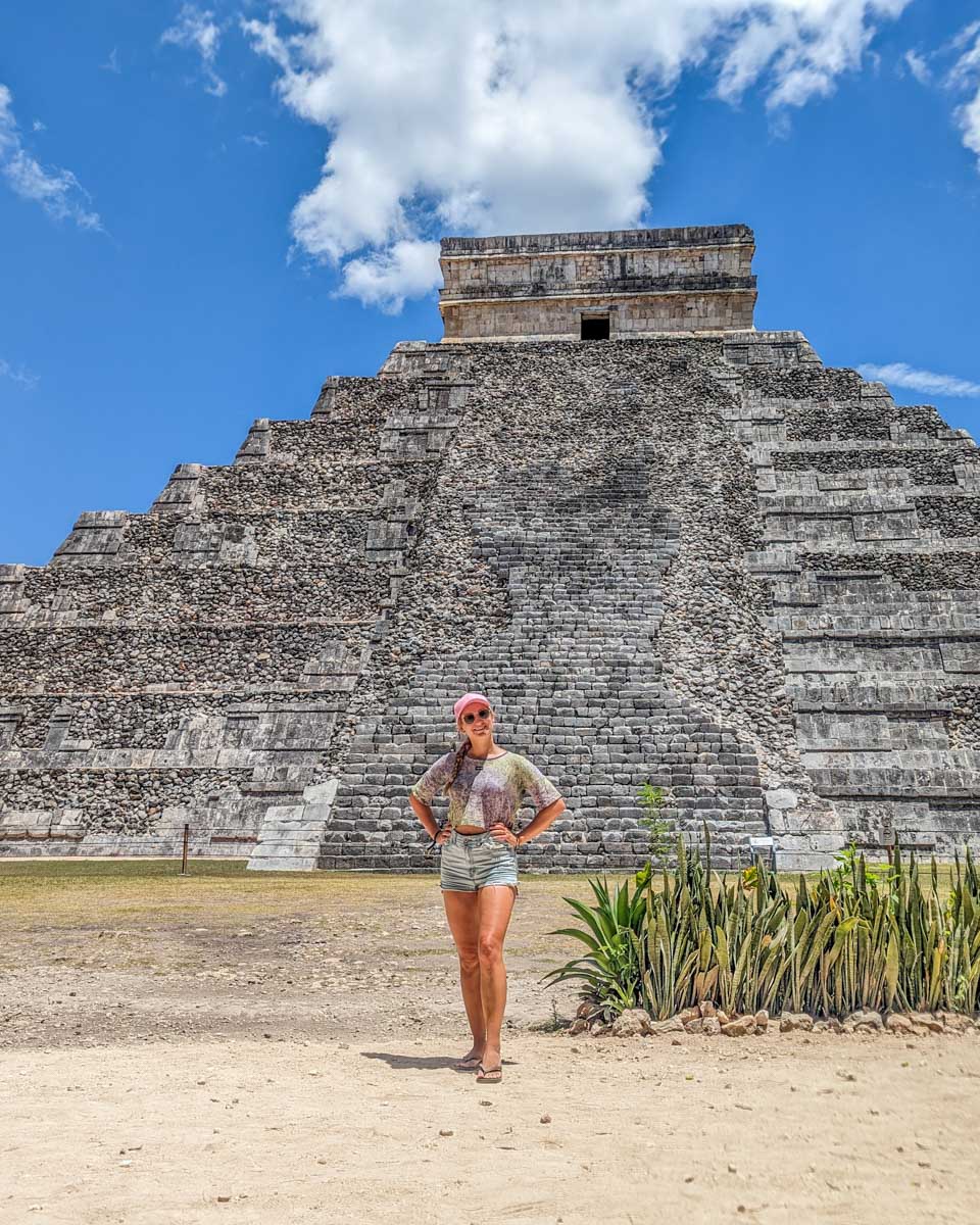 Bailey poses for a photo at Chichen Itza with the main temple in the background