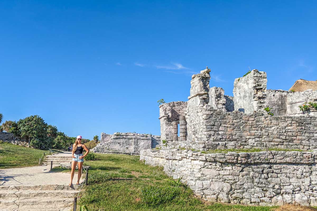 Bailey with the House Of The Halach Uinic at the Tulum Ruins