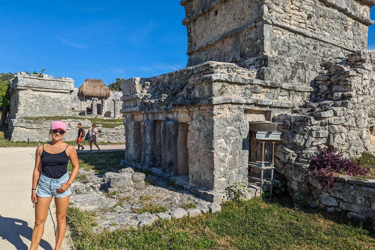 Bailey with the Temple Of The Frescoes at the Tulum Ruins, Mexico