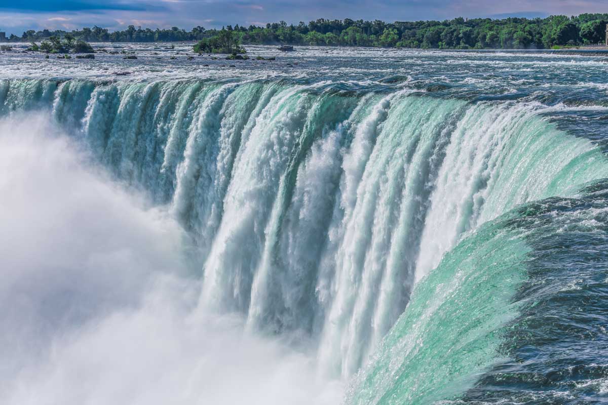 water rushes over Niagara Falls, Canada