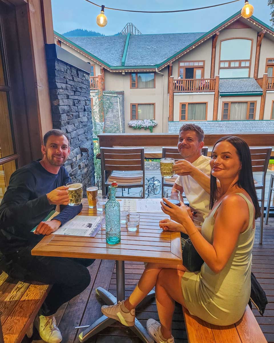 A group of people at Three Bears Brewery & Restaurant in Banff