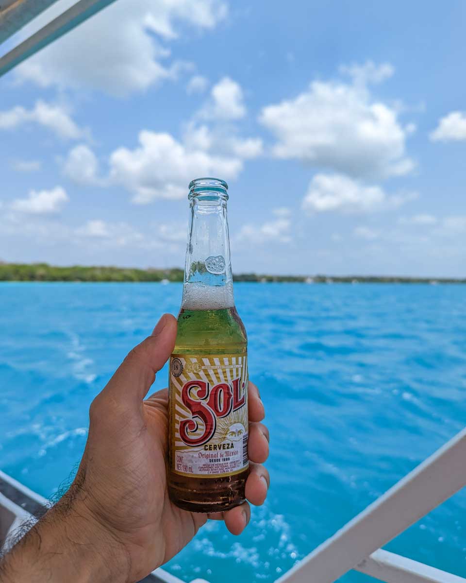 A sol beer from our Bacalar boat tour in Mexico