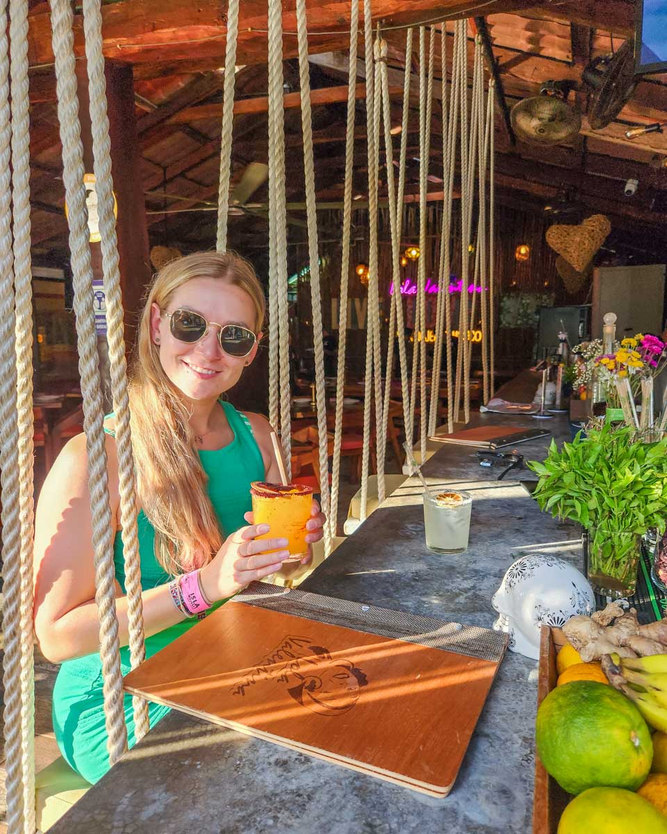 Bailey drinks a cocktail on Isla Mujeres