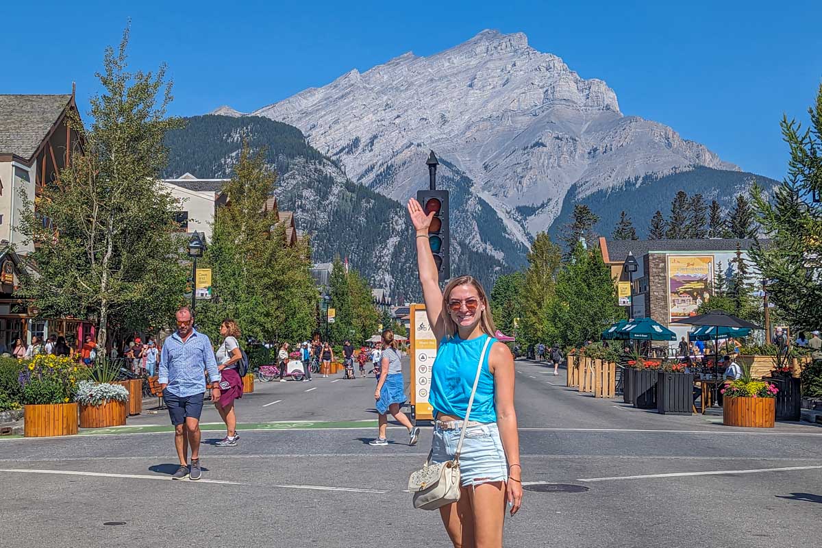 Bailey poses for a photo on Banff Ave walking street