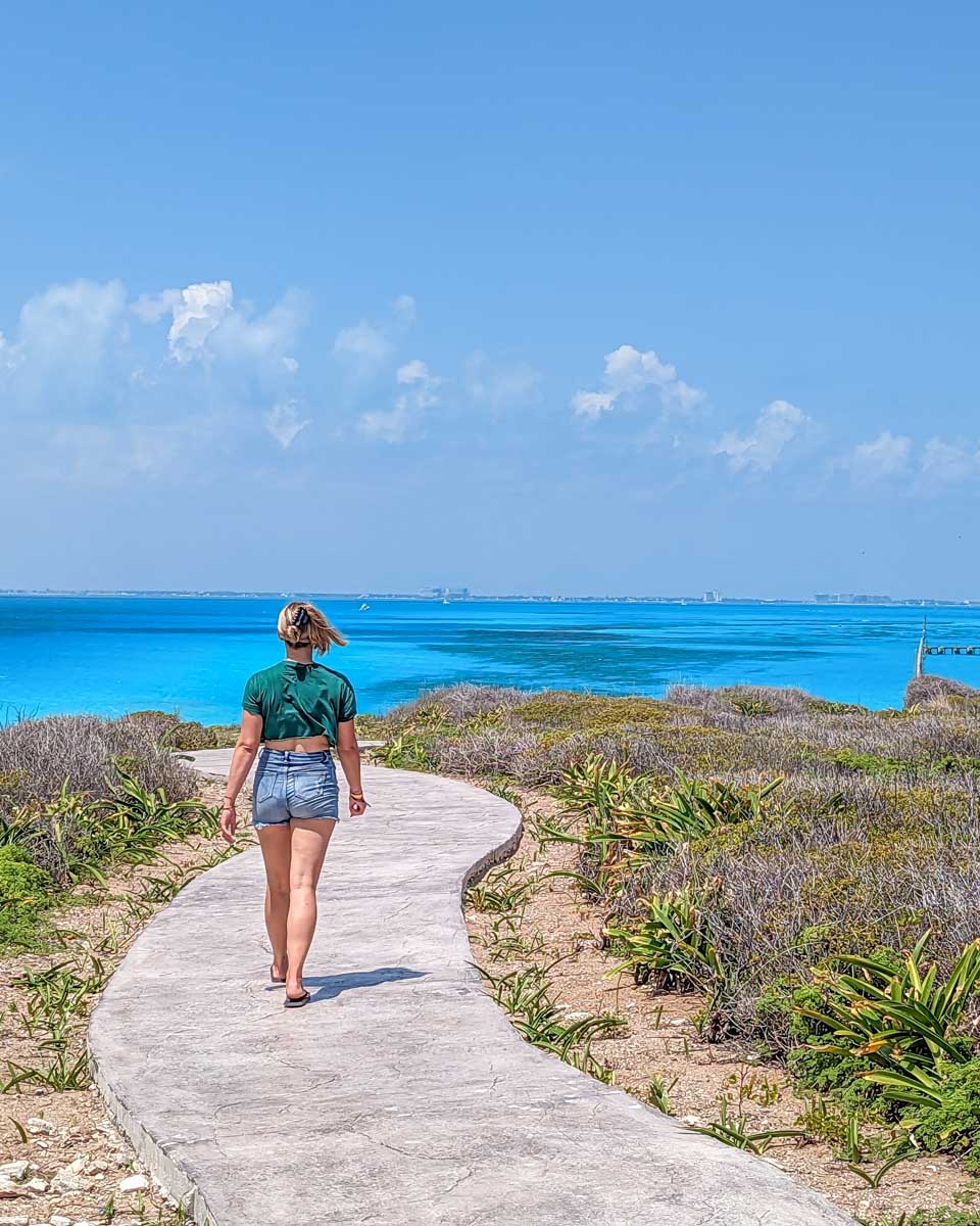 Bailey walks a path on Punta Sur, Isla Mujeres