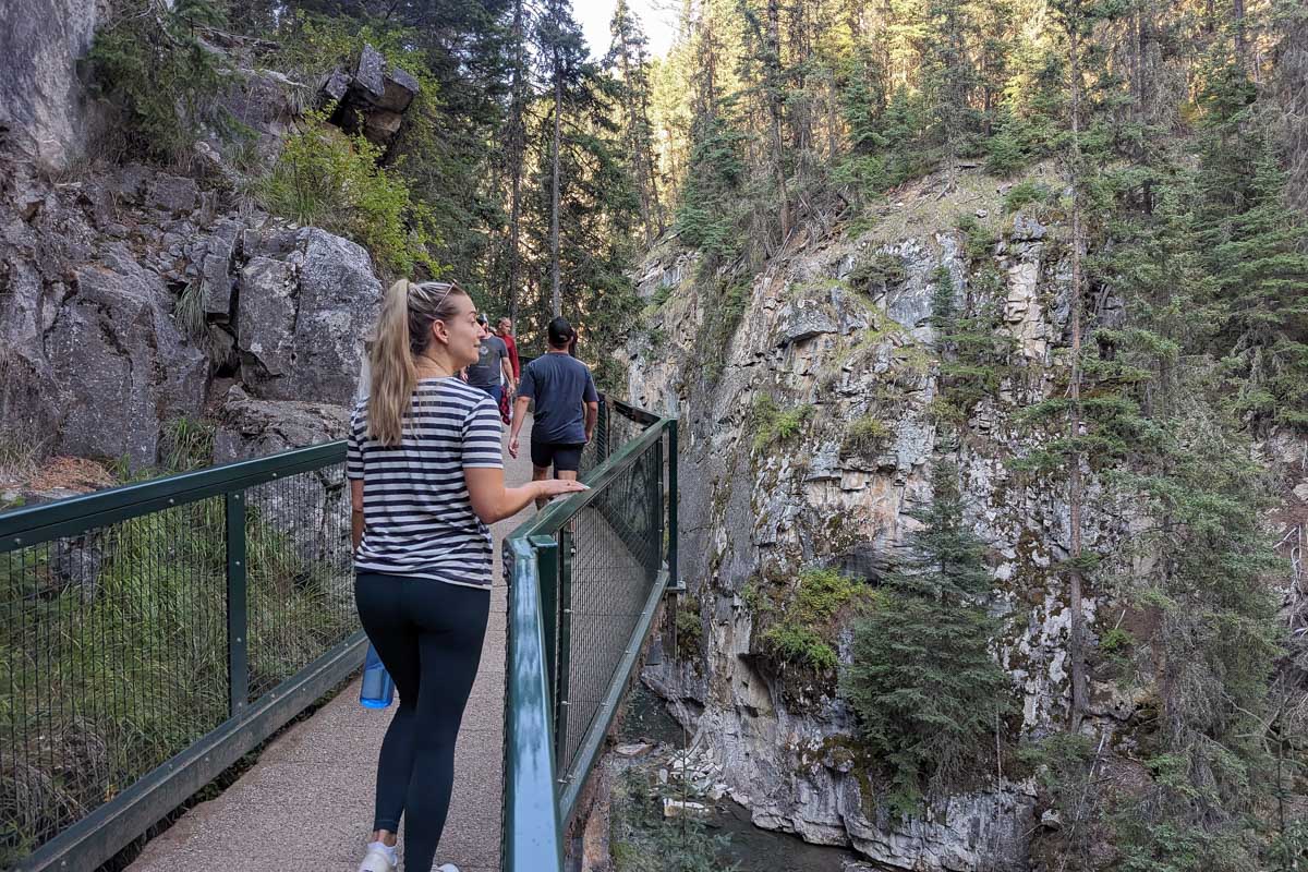 Bailey walks along the boardwalk at Johnston Canyon in Banff National Park