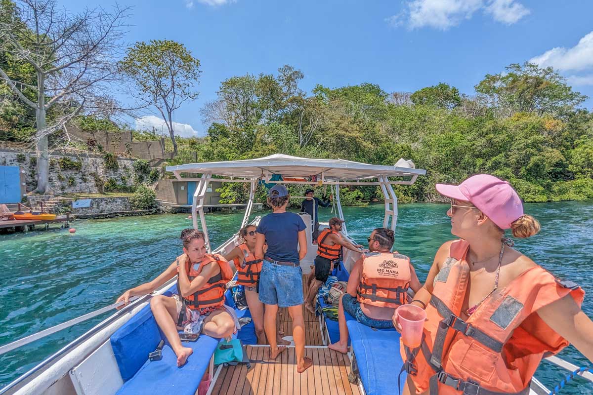 Bailey with a drink on our Bacalar boat tour