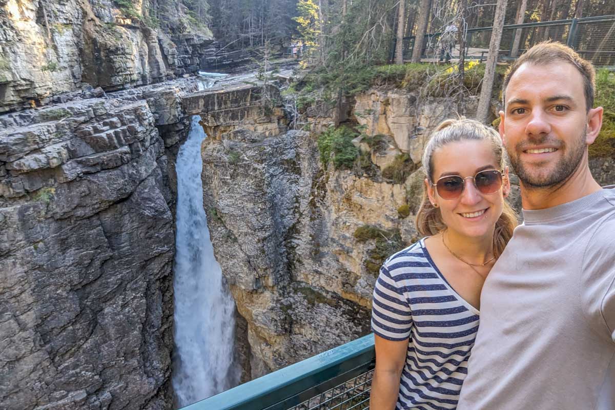 Daniel and Bailey take a selfie at the upper falls at Johnston Canyon in Banff National Park