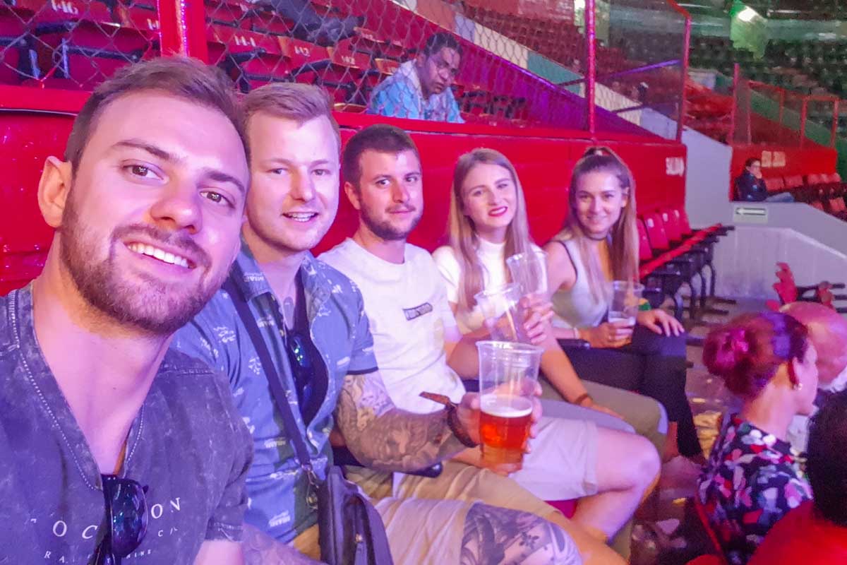 Daniel and Bailey with their Lucha Libre tour group take a seflie at the show in Mexico City