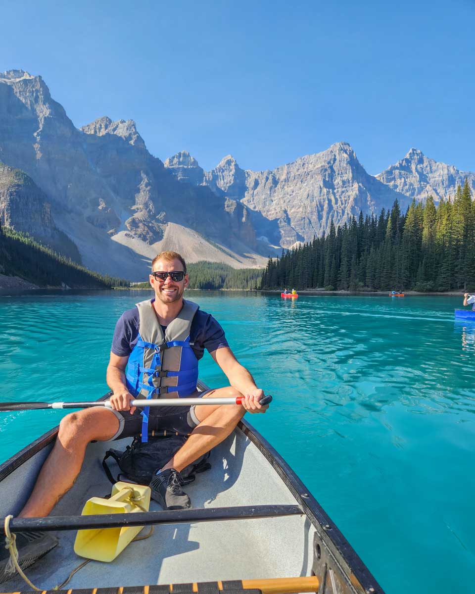 Daniel in a canoe on Moraine Lake in Banff National Park, Canada