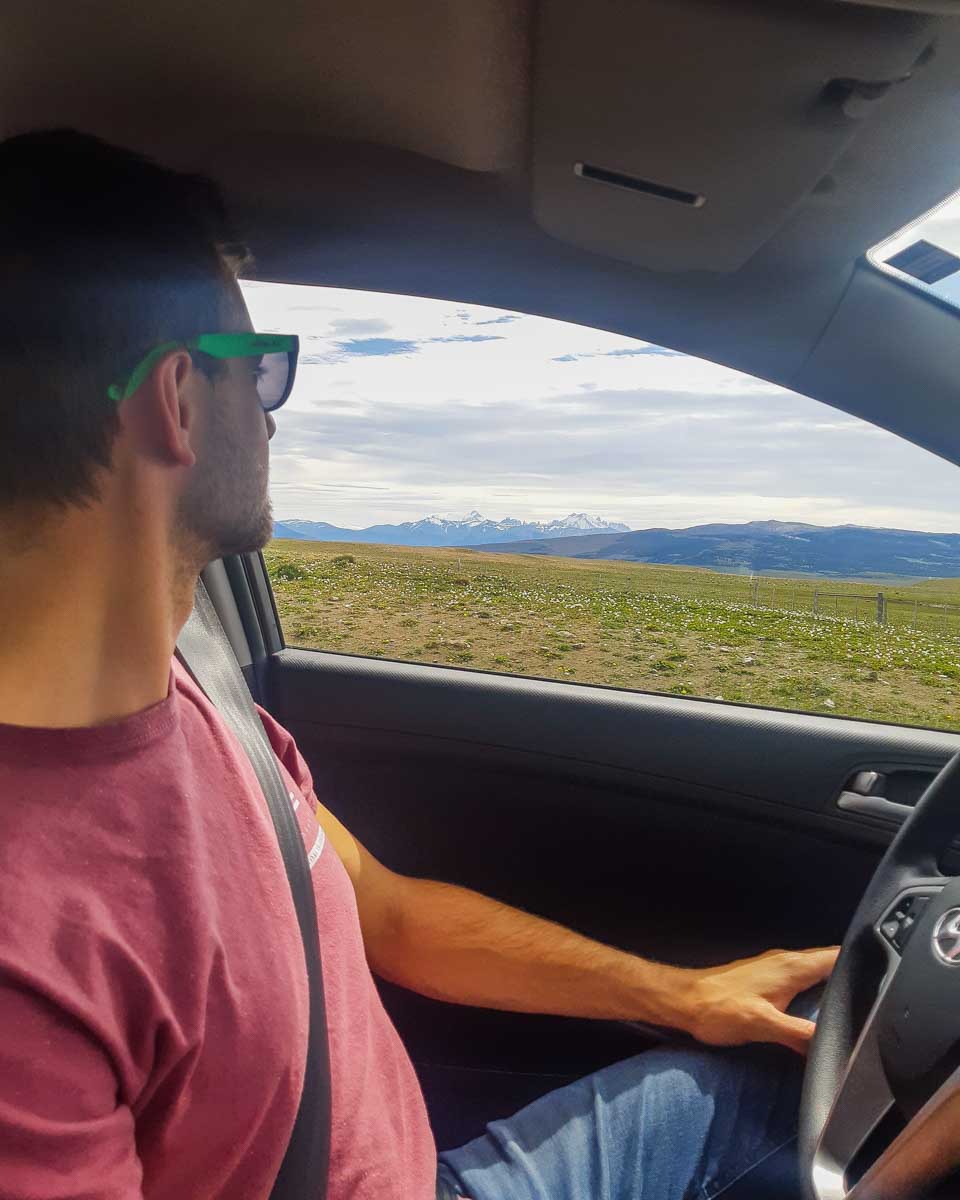 Daniel looks out the window of his rental car in Argentina