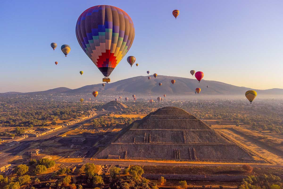 Hot Air Balloons fly over Teotihuacán at sunrise