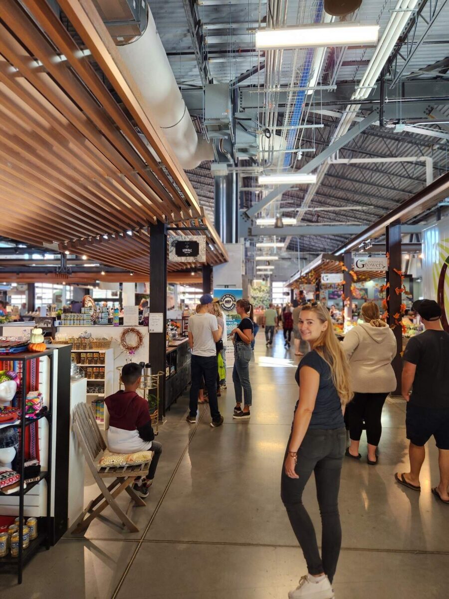 Bailey walks through the indoor Farmer's Market in West Calgary