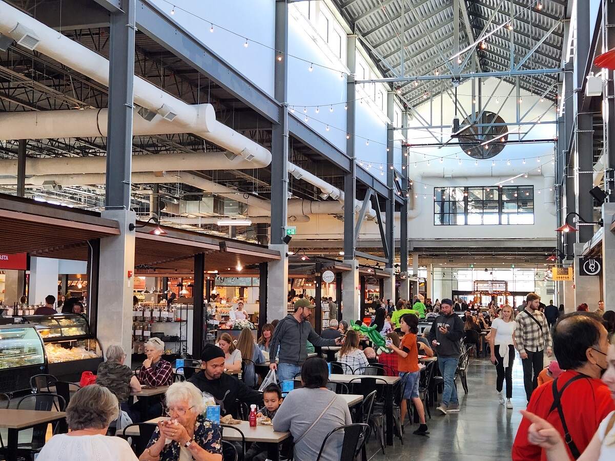 the indoor farmers market in calgary inside seating area of the food court