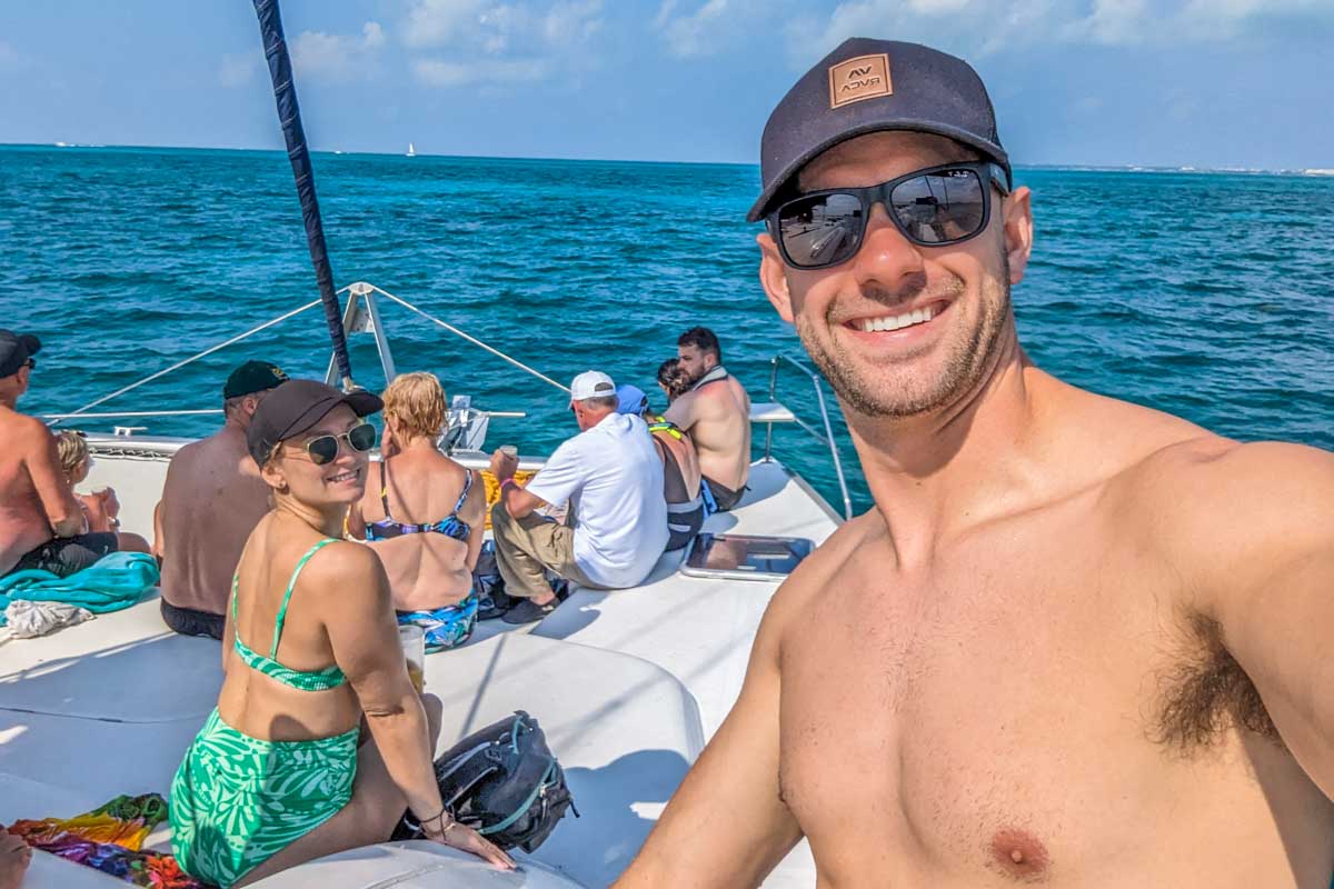 Daniel and Bailey take a selfie on a Cancun Sunset Catamaran cruise