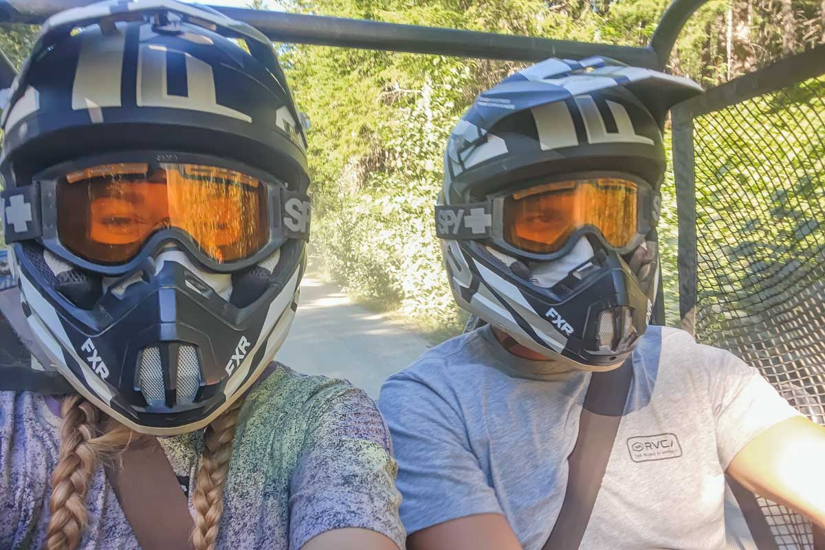 Daniel and Bailey take a selfie while driving an ATV in Cancun, Mexico