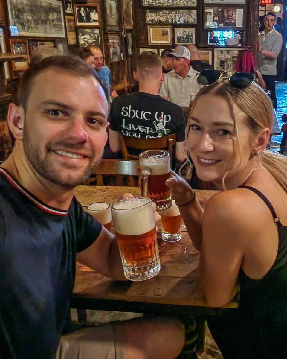 Daniel and Bailey take a selfie at McSorley's Old Ale House in New York City