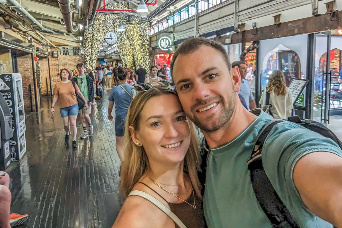 Daniel and Bailey take a selfie inside the Chelsea Market in NYC