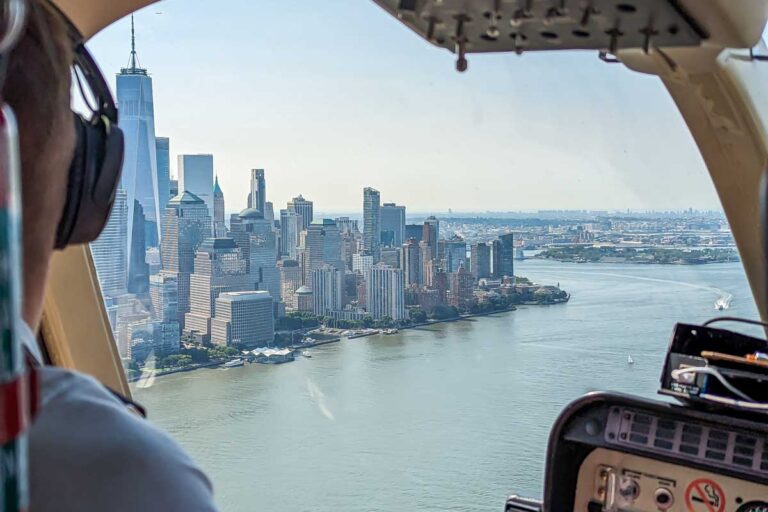 View out the front of a helicopter in New York CIty of Manhattan