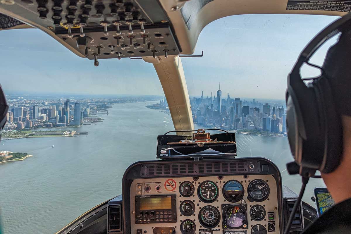 View out the front of the helicopter of the Hudson River on a New York City Helicopter ride